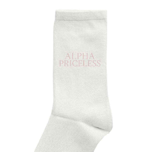 Alpha Priceless Signature Socks in soft white fabric with minimalist branding.