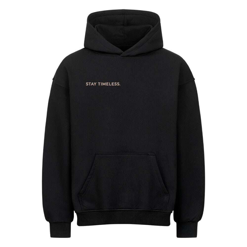 VACANCY Stay Timeless Oversized Hoodie in black with gold text "STAY TIMELESS."