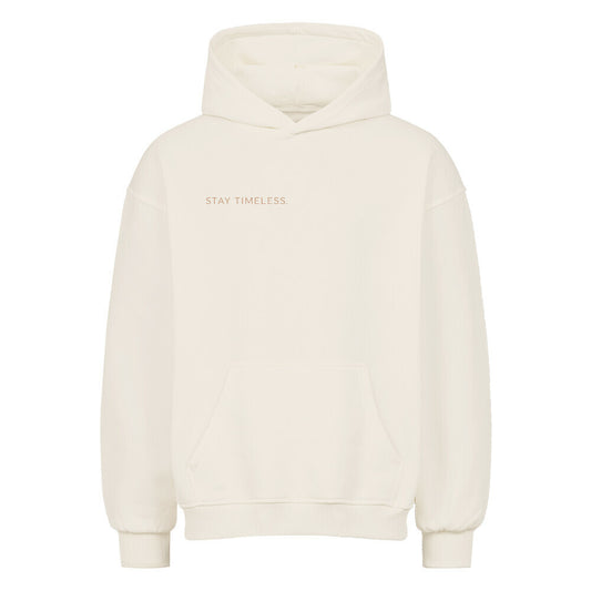 VACANCY Stay Timeless Oversized Hoodie in cream color with Stay Timeless text on the front.
